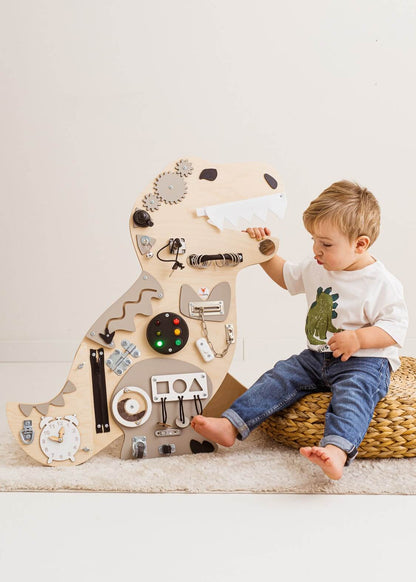 Motorikbrett Rudi Rex mit Spielelementen für Kinder